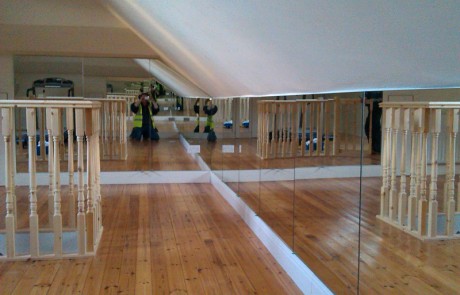 Wall of Mirrors in Converted Attic