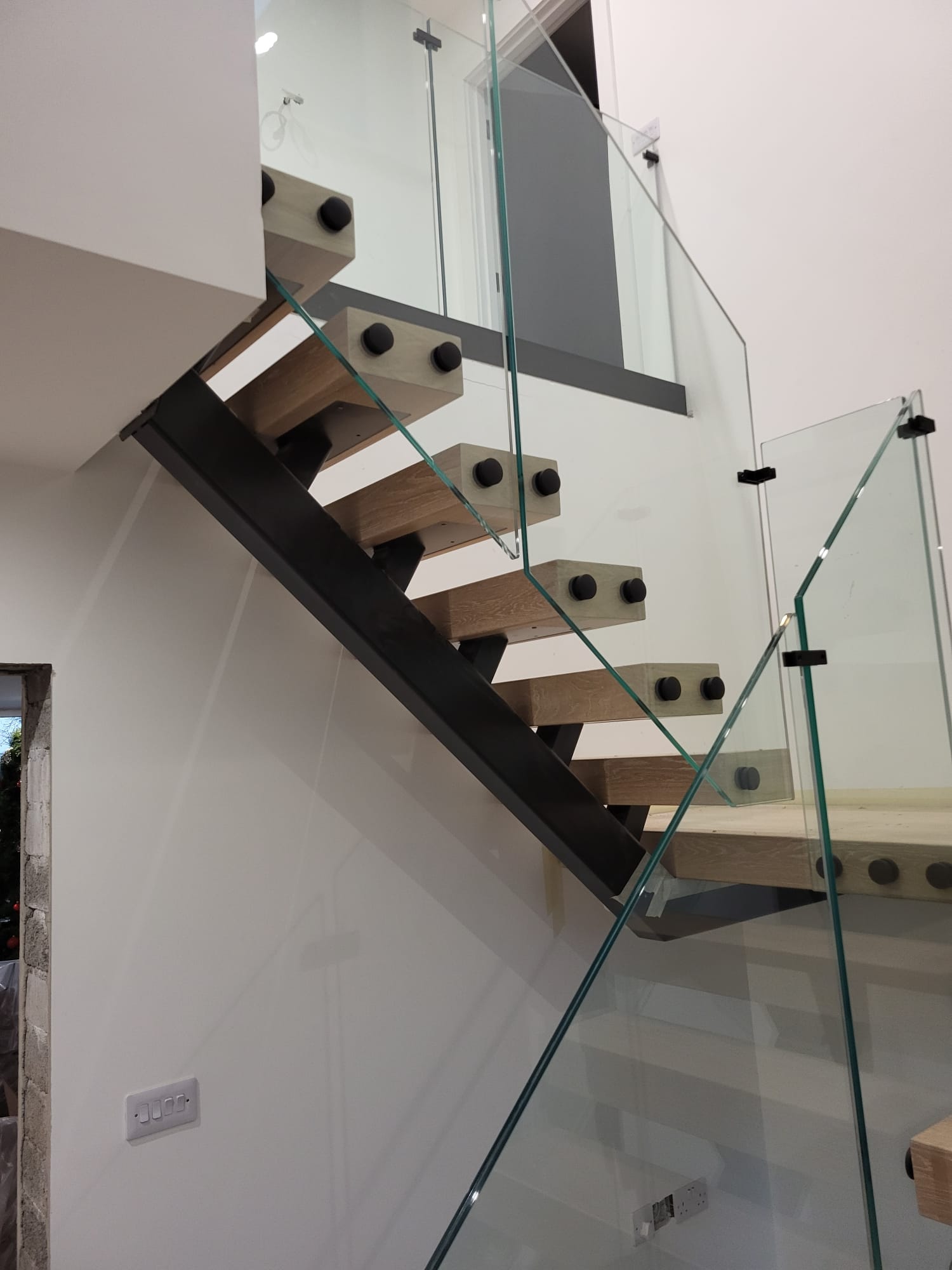 Bolt On Stair Glass Using Black Fittings Modern Staircase With Wooden Steps And Glass Railings