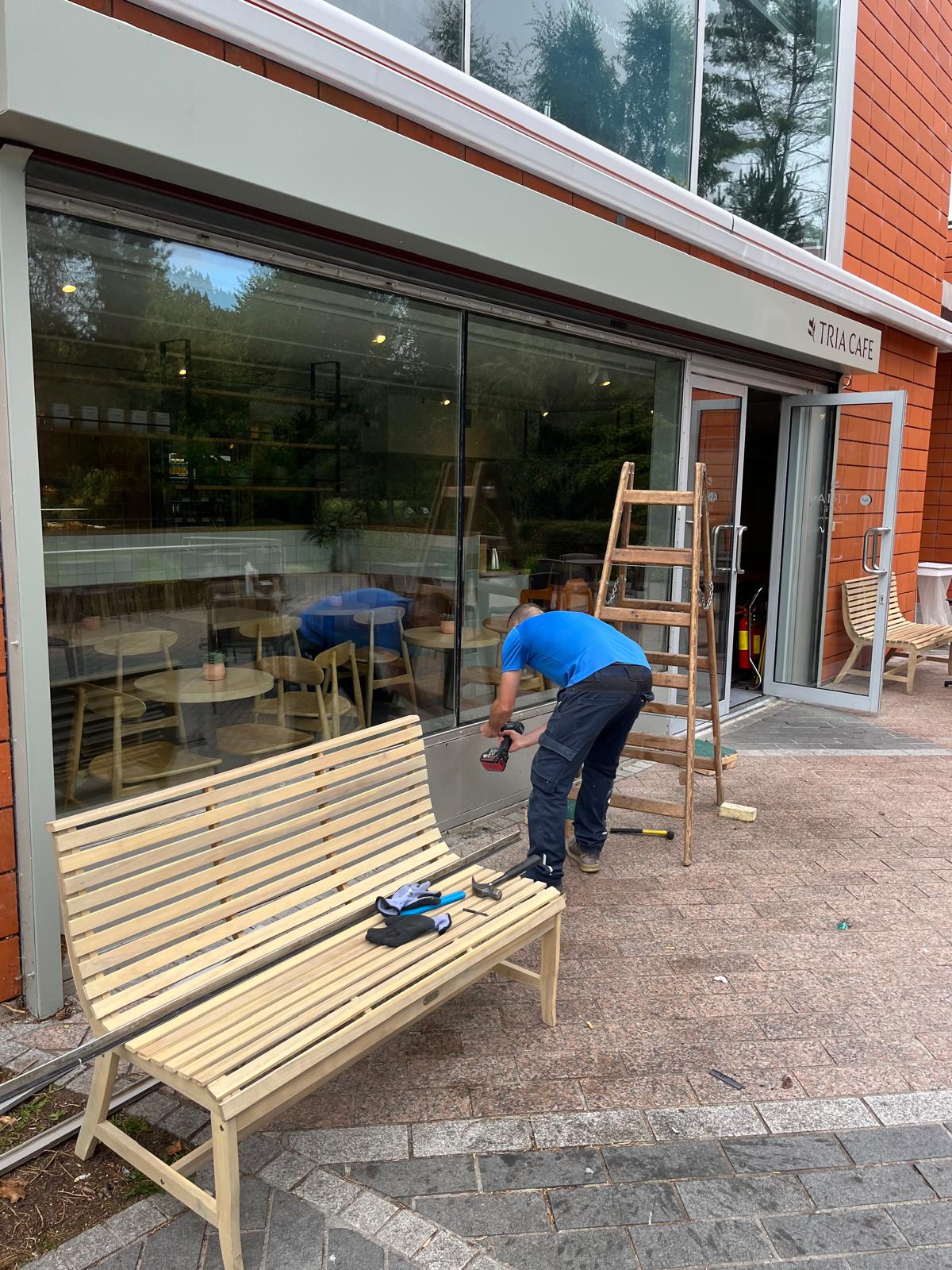 Northside Glass Ltd. Technician Performing A Commercial Glass Replacement On A Large Shop Window In Cork, Ireland.