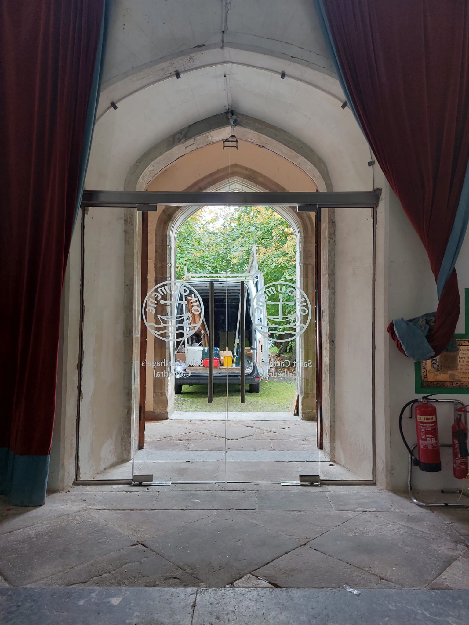 Swing-Type Toughened Glass Doors Leading To Outdoor Architectural Space
