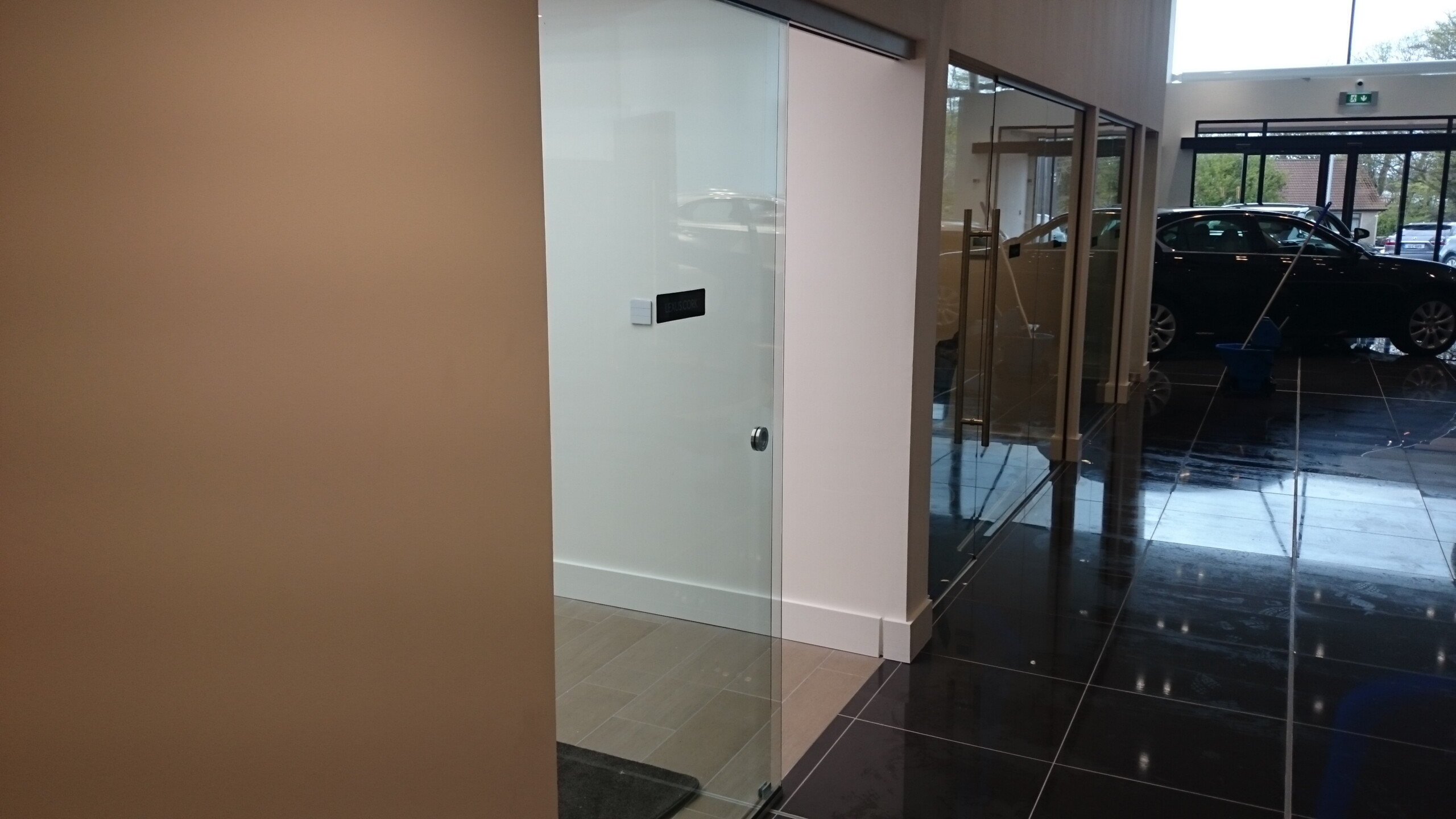 Nsg Sliding Doors 1 Full Height Glss Sliding Door In A Car Showroom 006 Scaled