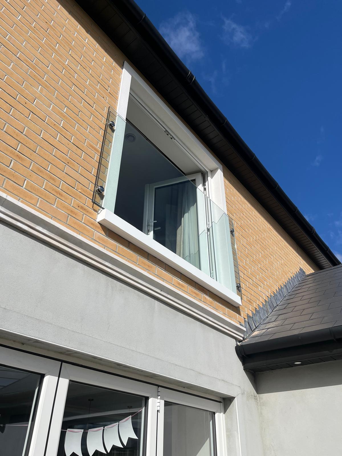 Glass Juliette Balcony Northside Glass Ltd. Installed A Modern Frameless Glass Juliet Balcony On A Brick Residential Building In Cork, Ireland.