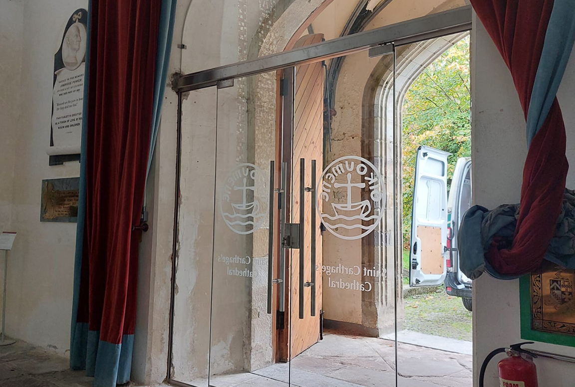 Hydraulic Swing Toughened Glass Doors Hydraulic Swing Toughened Glass Doors With Etched Branding And Garden View