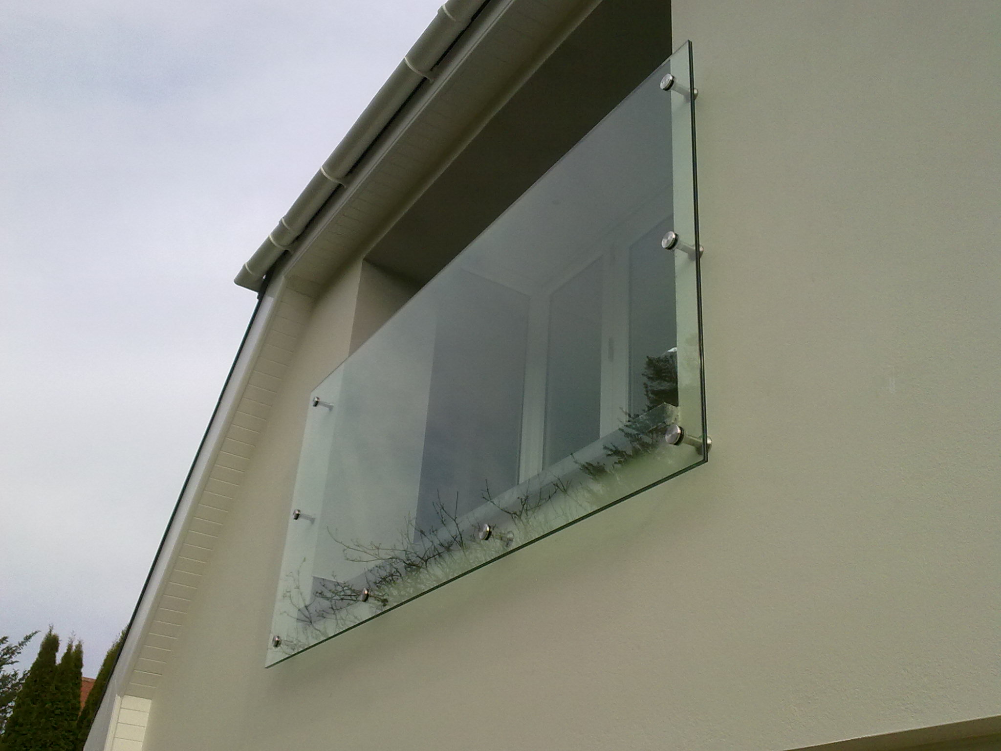Northside Glass Ltd. Installed A Modern Frameless Juliette Balcony Glass Guarding System On A Residential Building In Cork, Ireland.