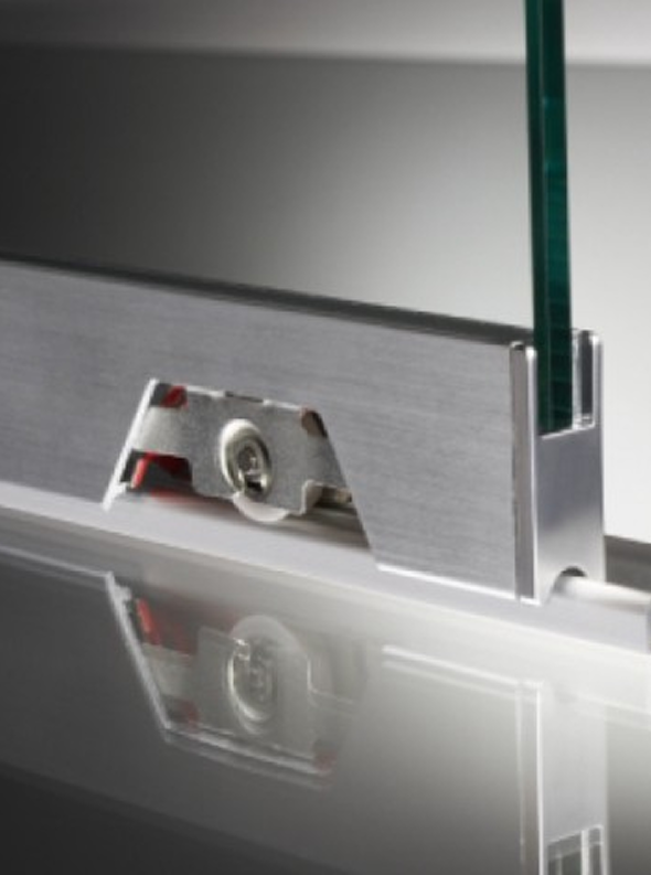Sliding Glass Doors Close-Up Of Sliding Glass Door Mechanism With Metal Track And Roller System.