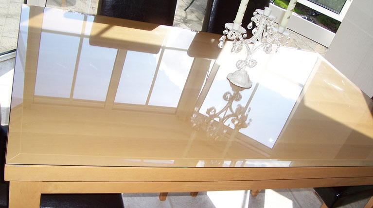 Table Top Glass Protector Glossy Wooden Table Reflecting Chandelier Light In Sunlit Room