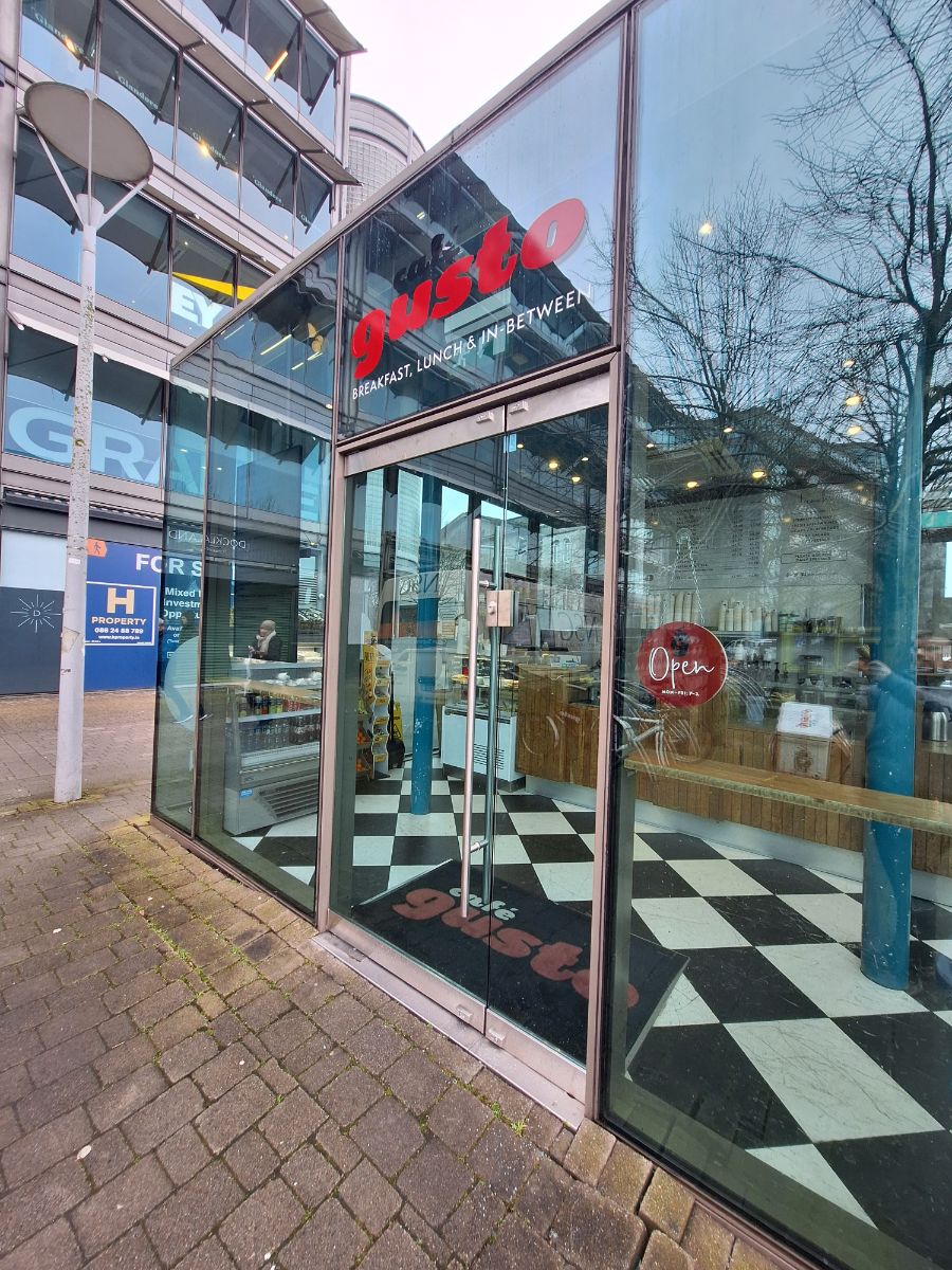 Modern Restaurant Glass Entrance With Checkered Floor